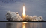 Space shuttle Atlantis lifts off from pad 39A at the Kennedy Space Center at Cape Canaveral
