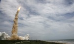 The space shuttle Atlantis STS-135 lifts off from launch pad 39A at the Kennedy Space Center in Cape Canaveral, Florida